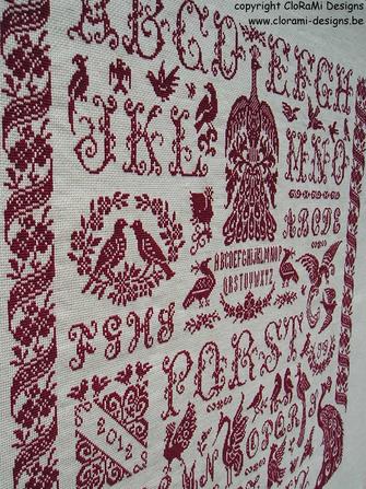 afbeelding van de rode kruissteek merklap Ref 034 Flying High Sampler van CloRaMi Designs