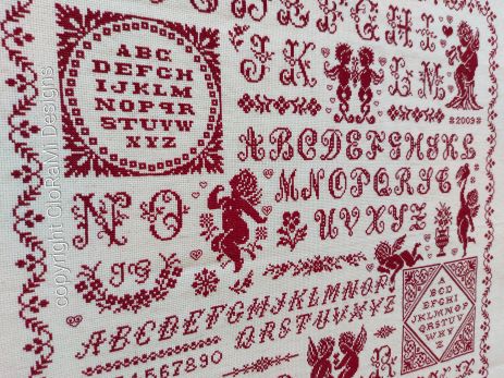 afbeelding van de rode kruissteek merklap Ref 062 Marquoir Angélique