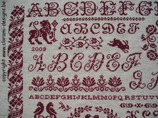 afbeelding van de rode kruissteek merklap Ref 053 Marquoir Romantique van CloRaMi Designs
