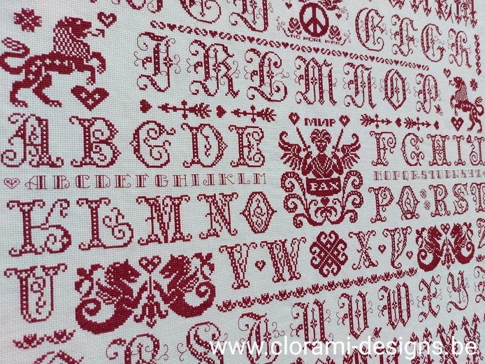 afbeelding van de rode kruissteek merklap Ref 070 Peace Sampler