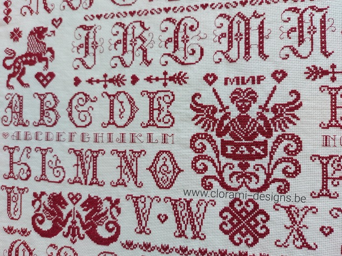 afbeelding van de rode kruissteek merklap Ref 070 Peace Sampler