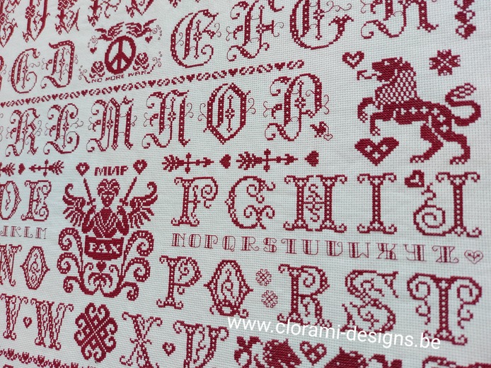 afbeelding van de rode kruissteek merklap Ref 070 Peace Sampler