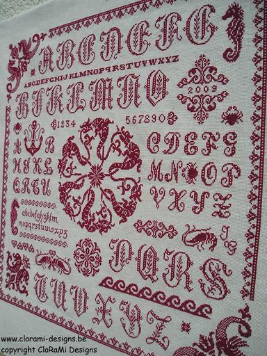 afbeelding van de rode kruissteek merklap Ref 051 Sea Creatures Sampler van CloRaMi Designs