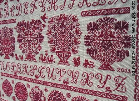 afbeelding van de rode kruissteek merklap Ref 016 Vierlanden Spring Sampler van CloRaMi Designs